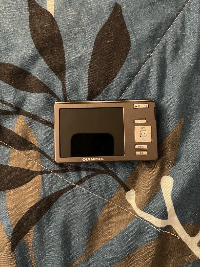 Olympus FE 4030 (Category: Cameras) located in Quezon City. Submitted by live_louisee (Listing ID 1469922579, Image 2). Description: - Model: Olympus FE Compact Digital Camera - Color: Champagne Gold - Condition: Powers on, menus and screen work normally, captures shots fine. Note: Small dead pixel/ink spot on the LCD screen. - Inclusions: Camera, battery, charger, pouch negotiable.