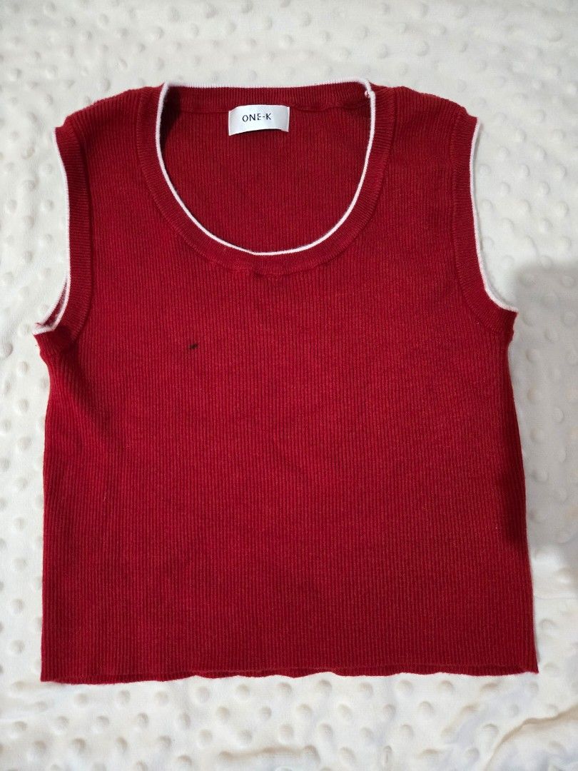 ONE-K Red Ribbed Tank Top with White Trim (Category: Sleeveless) located in Manaoag. Submitted by jnsl. (Listing ID 1469800615, Image 1). Description: BKK BRAND ( ONE-K) TWICE USED. W MARKER STAIN SMALL - LARGE.