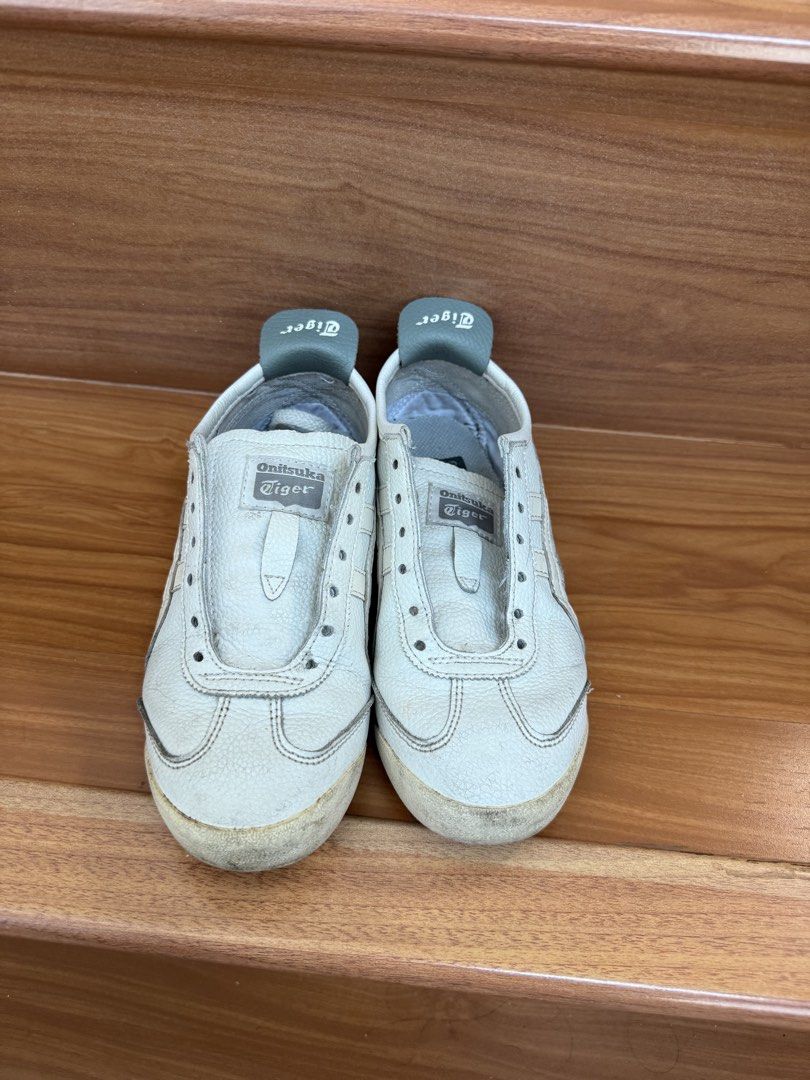 Onitsuka Mexico 66 (Category: Sneakers) located in Manila. Submitted by declutter.with.vi (Listing ID 1469807877, Image 1). Description: Brand: Onitsuka Color: White and Gray Size: 22.5 cm Condition: 6/10 needs washing .