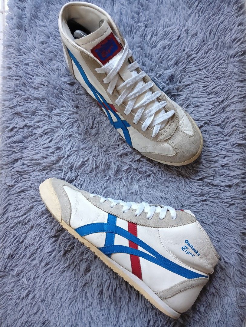 Onitsuka Tiger Tokyo Mid High Top Sneakers (Category: Sneakers) located in Manila. Submitted by sosukeaize52352 (Listing ID 1469834381, Image 3). Description: - Authentic Onitsuka Tiger Tokyo mid-top sneakers - Premium white leather upper with stylish grey suede overlays - Iconic blue and red side stripes with 'TOKYO' blue lettering on the heel - Padded collar and clean white interior lining for all-day comfort - Durable rubber outsole with excel