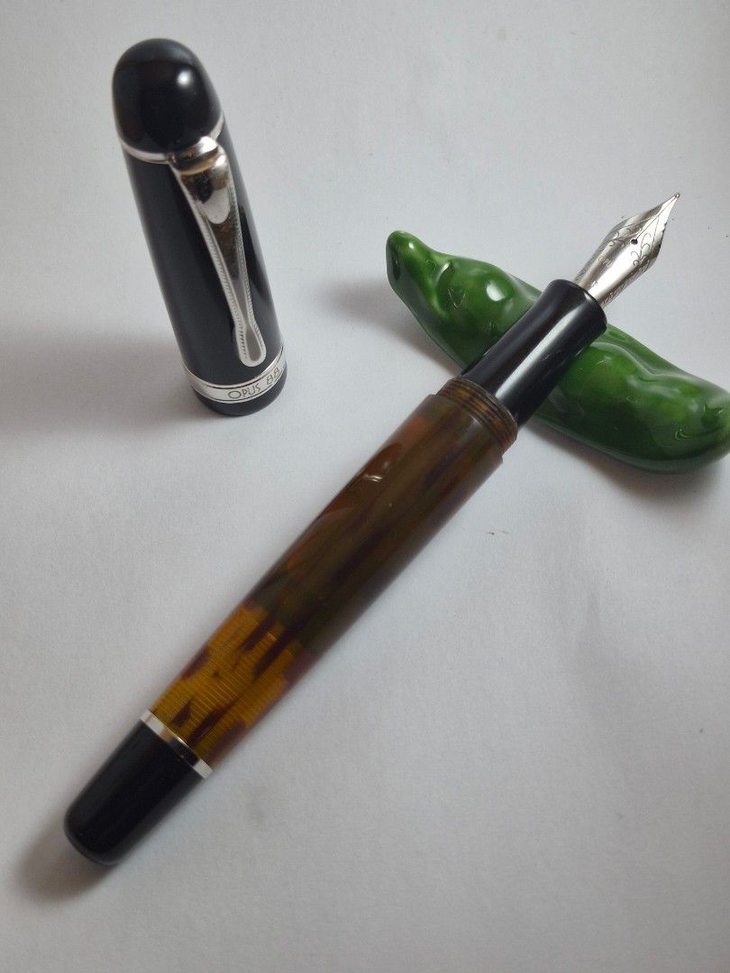 Opus 88 Jazz Fountain Pen (Category: Craft Supplies & Tools) located in Pasig City. Submitted by penpaul (Listing ID 1469863878, Image 1). Description: Opus 88 Jazz Amber with F steel nib.