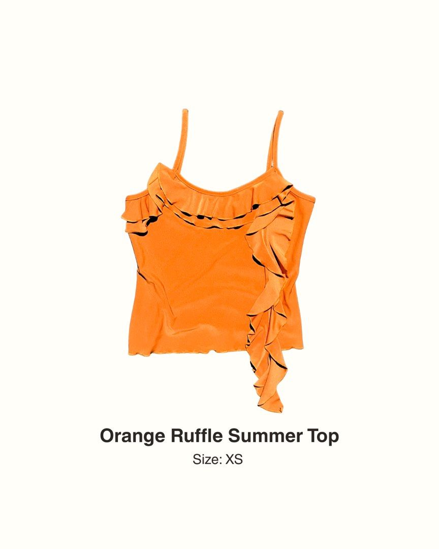 Orange Ruffle Summer Top (Category: Sleeveless) located in Manila. Submitted by maaya.rikit (Listing ID 1469936244, Image 1). Description: - Vibrant orange camisole top - Playful ruffles along the neckline - Unique asymmetric cascading ruffle down the right side - Thin, adjustable shoulder straps - Lightweight and breathable fabric, ideal for warm weather - Bright and fun statement piece.