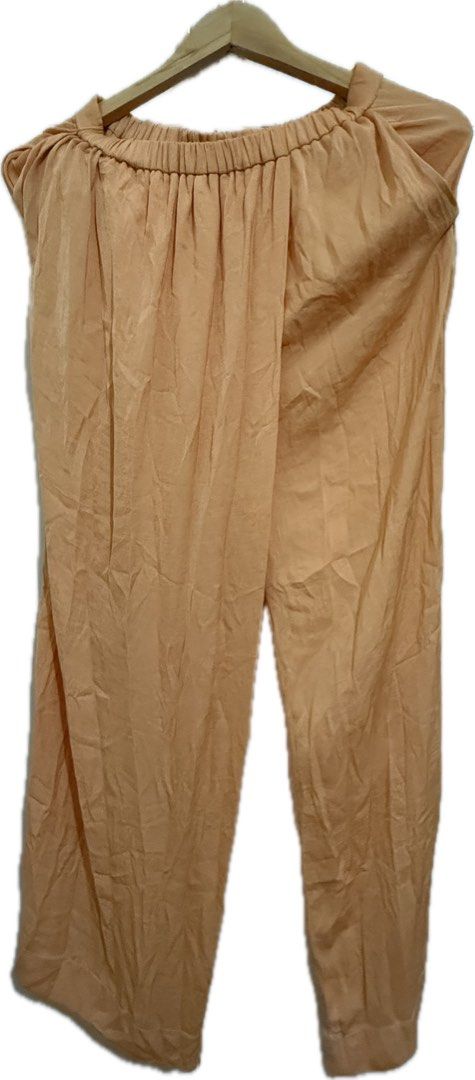 Orange Wide Leg Pants (Category: Jeans) located in Quezon City. Submitted by mintconditionph (Listing ID 1469904837, Image 1). Description: fits S-M Perfect beach wear.