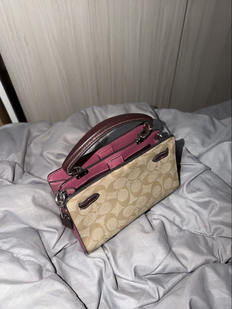 Original Coach Mini Lane Top Handle Bag (Category: Luxury Bags & Wallets) located in Manila. Submitted by darlingria (Listing ID 1469791802, Image 2). Description: excellent conditon! no scratches, scuffs, or rubs on leather panels and coated canvas. clean interior (no stains or marks). shiny and good as new. .