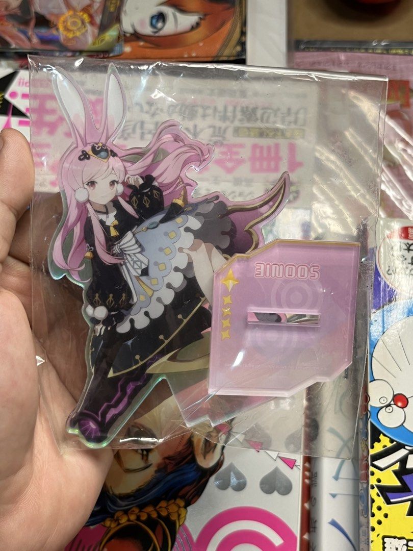 Original Eversoul Soonie Acrylic Standee Figure (Category: Character Goods) located in Gapan. Submitted by lunashop14 (Listing ID 1469799364, Image 1). Description: - 100% Original Eversoul Soonie acrylic standee figure - Features a pink-haired anime character with bunny ears and a detailed dark dress - Includes a matching purple base with the printed character name - Brand new, unopened, and still sealed in its original clear plastic packaging -