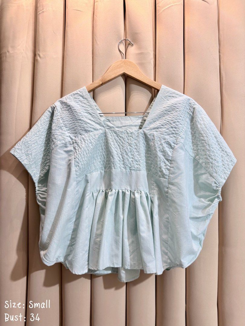 OVERSIZED BABY DOLL BLOUSE (Category: Blouses) located in Manila. Submitted by glamstylemnl (Listing ID 1469915048, Image 1). Description: ♡ SIZE: Small ♡ BUST: 34 ♡ Swipe left to see the actual color & details ♡ smock blouse, textured yoke, gathered hem, with small washable stain ♡ HQ • 9/10 ♡ Ready to wear 👚.