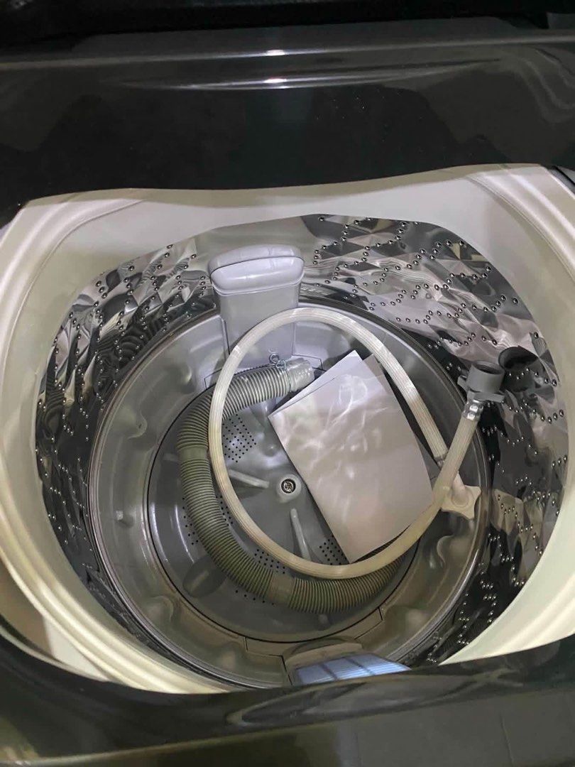 Panasonic Fully Automatic Washing Machine (Category: Washing Machines and Dryers) located in Calamba. Submitted by wildcrystal.d61f6a (Listing ID 1469873060, Image 2). Description: - Brand/Model: Panasonic - Capacity: 7.5kg fully automatic top load - Color/Design: Dark grey with top digital control panel and stainless steel drum - Inclusions: Inner tub hoses, water inlet pipe, and original product box - Condition: Brand new condition, 1 week old 
