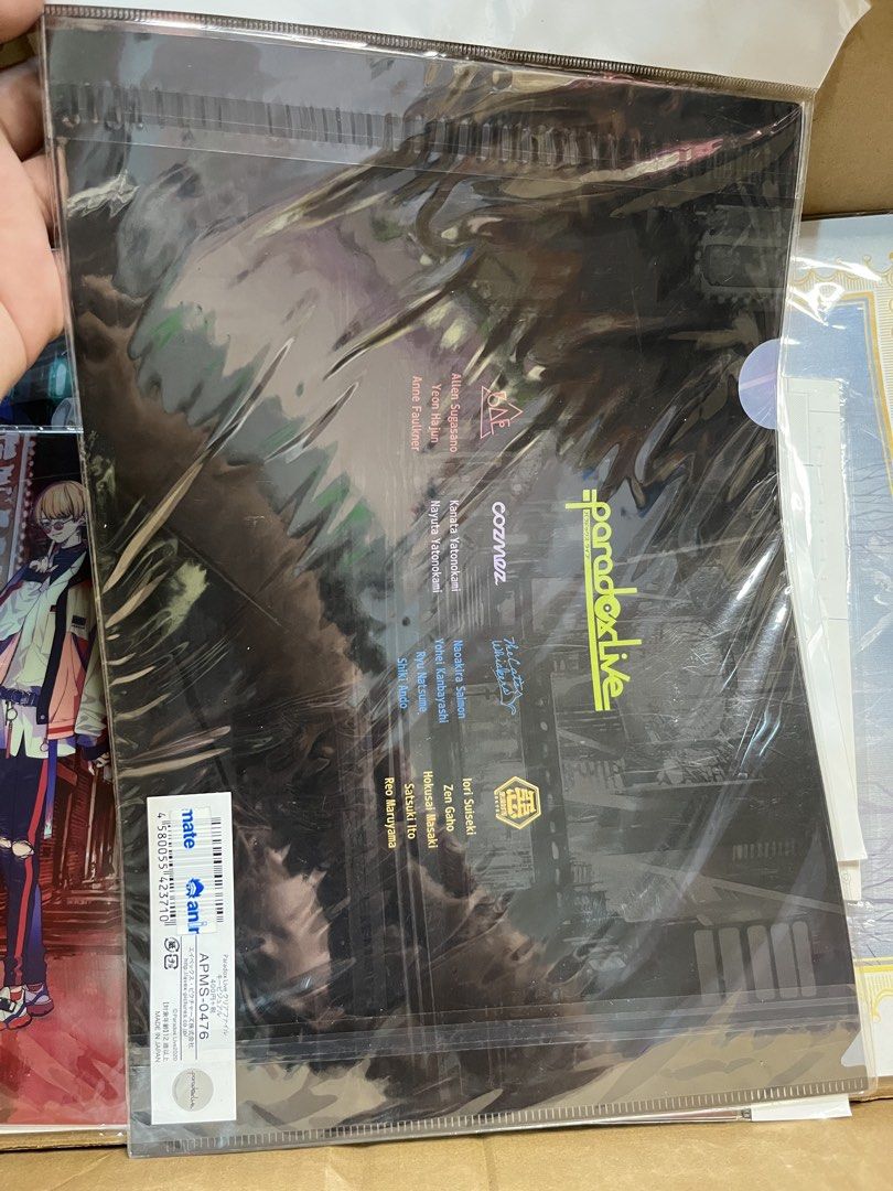Paradox Live Key Visual Clear File Anime Merchandise (Category: Stationery & School Supplies) located in Gapan. Submitted by lunashop14 (Listing ID 1469849138, Image 2). Description: - Official Paradox Live anime merch distributed by animate - Features key visual illustration with BAE, Cozmez, The Cat's Whiskers, and Akanyatsura - Standard A4 size document folder for organizing papers - Brand new and sealed in original plastic packaging with barc