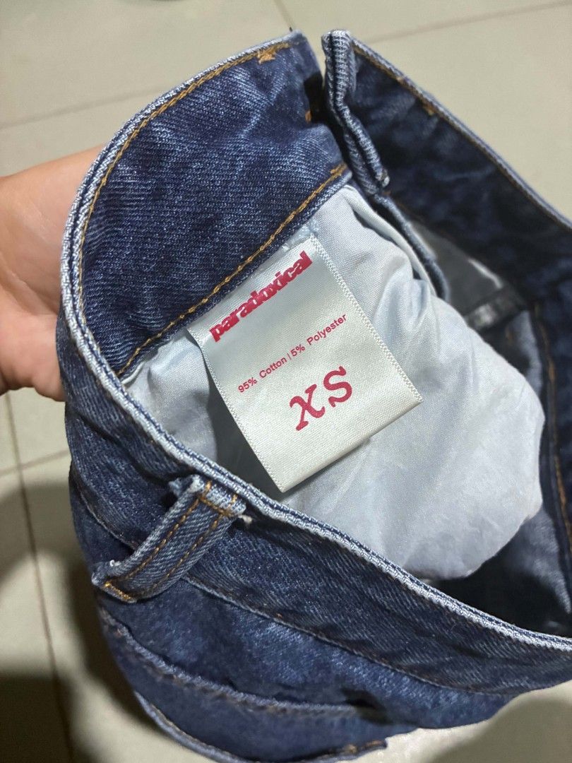 Paradoxical Denim Shorts Size XS (Category: Shorts) located in Manila. Submitted by anjie3030 (Listing ID 1469905949, Image 3). Description: - Brand: Paradoxical - Color: Dark blue wash - Size: XS - Material: 95% cotton, 5% polyester - Features: Two back pockets, leather brand patch on waistband - Style: Classic everyday casual wear shorts.