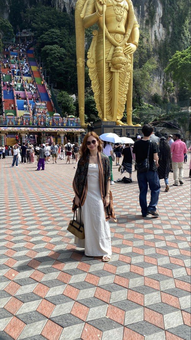 Patterned Scarf with Brown and Gold Borders (Category: Coats, Jackets and Outerwear) located in Manila. Submitted by plsbuymyclotheshehe (Listing ID 1469870855, Image 3). Description: - Elegant dark pattern with rich brownish-gold borders - Long rectangular shape, drapes effortlessly over shoulders or neck - Lightweight fabric, ideal for travel and cool indoor spots - Neutral tones easily match white dresses and everyday casual wear - Condition: 