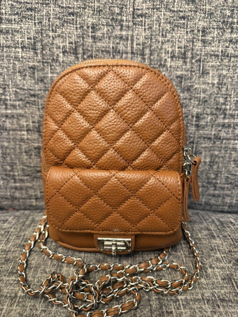 PAZZION MINI BACKPACK 8x9 inches genuine leather (Category: Backpacks) located in Manila. Submitted by jaylo06 (Listing ID 1469894811, Image 1). Description: Issue ung presmark sa likod maganda ung leather as in pamana maganda maayus malinissilver pa hardwares binili namin sa singapore pinagkaliitan po ng anak ko hehe with dust bag sa may gusto pang bagets pm lang po thanks.