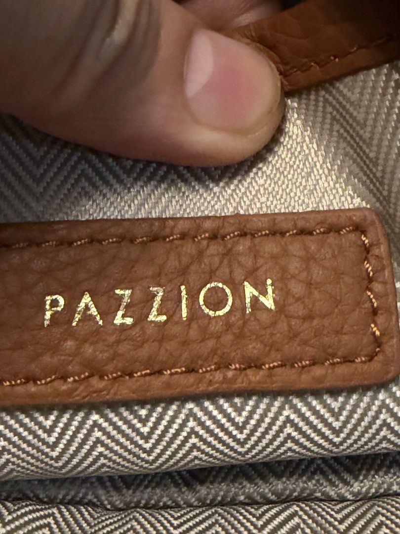 PAZZION MINI BACKPACK 8x9 inches genuine leather (Category: Backpacks) located in Manila. Submitted by jaylo06 (Listing ID 1469894811, Image 3). Description: Issue ung presmark sa likod maganda ung leather as in pamana maganda maayus malinissilver pa hardwares binili namin sa singapore pinagkaliitan po ng anak ko hehe with dust bag sa may gusto pang bagets pm lang po thanks.