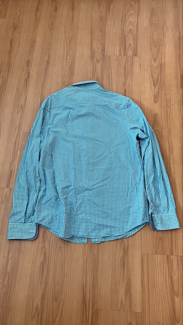 Penguin - Button down shirt (Category: Tshirts & Polo Shirts ) located in Manila. Submitted by foundgoods00 (Listing ID 1469896193, Image 3). Description: Kala mo taga Texas USA. Best fit sa moreno. My height is 5’8 Good condition. No issue..