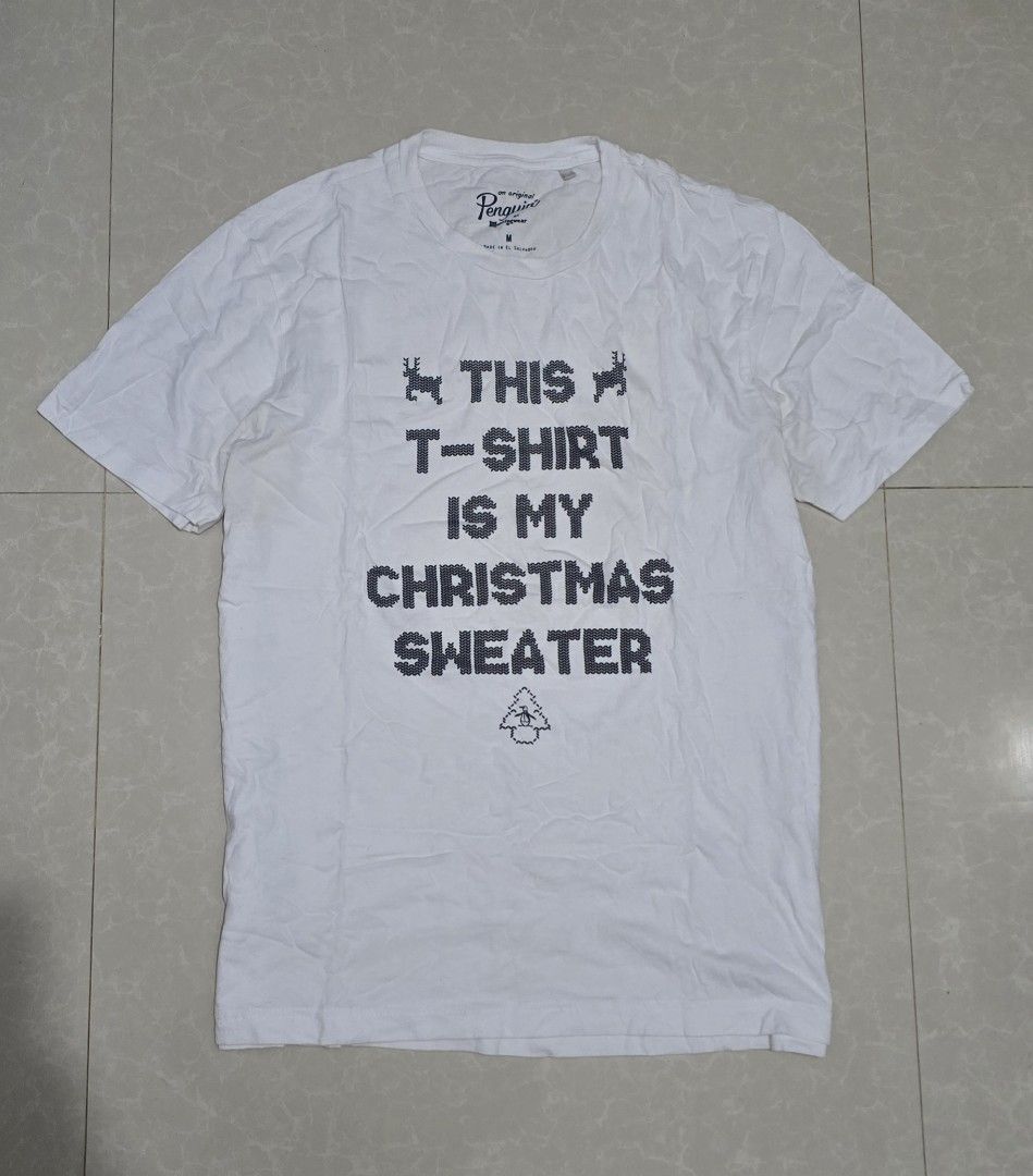 Penguin tshirt (Category: Tshirts & Polo Shirts ) located in El Nido. Submitted by marco.tandoc (Listing ID 1469904755, Image 1). Description: size: Medium width: 20 length: 27 no issue.
