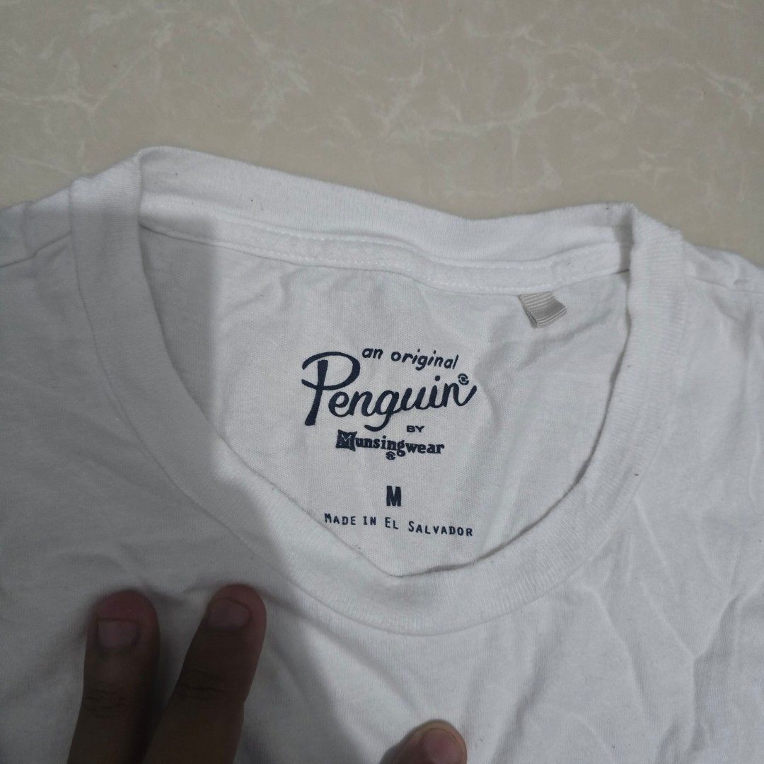 Penguin tshirt (Category: Tshirts & Polo Shirts ) located in El Nido. Submitted by marco.tandoc (Listing ID 1469904755, Image 2). Description: size: Medium width: 20 length: 27 no issue.