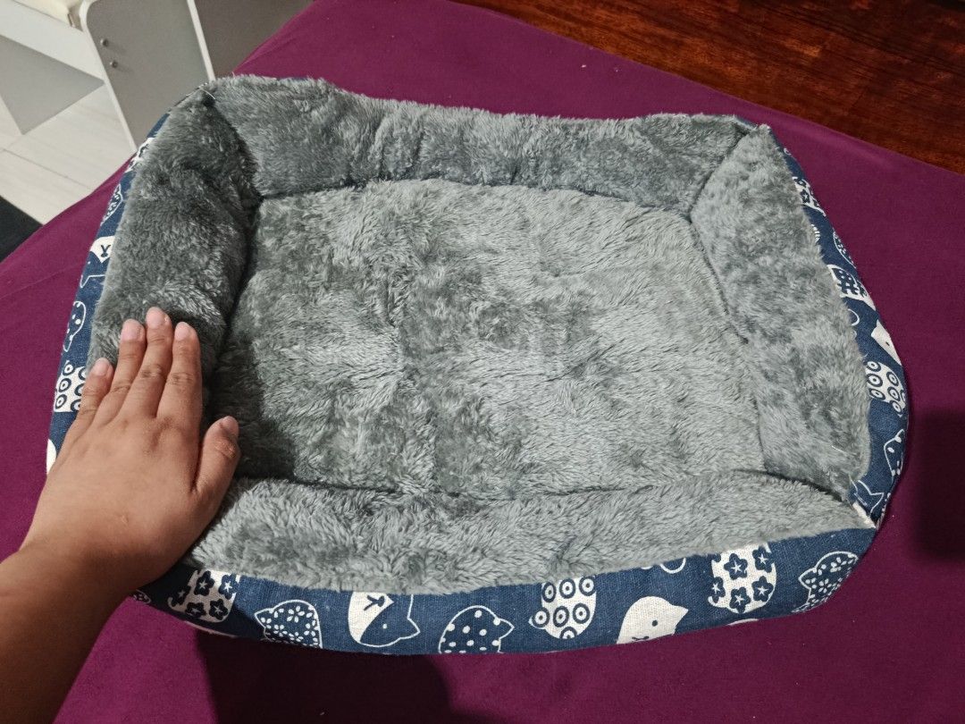 Pet Bed (Category: Homes & Other Pet Accessories) located in Manila. Submitted by camillemae82020 (Listing ID 1469806158, Image 3). Description: RFS: AYAW NG CATS KO, MAS GUSTO SA TILES JUSKOOO!! HAHAHAHA - Size: 50x40cm, ideal for small to medium dogs and cats - Design: Cute blue lucky cat print exterior with ultra-soft gray plush interior - Comfort: Thickly padded and cushioned walls for extra coziness and head support - Material: Waterproof an