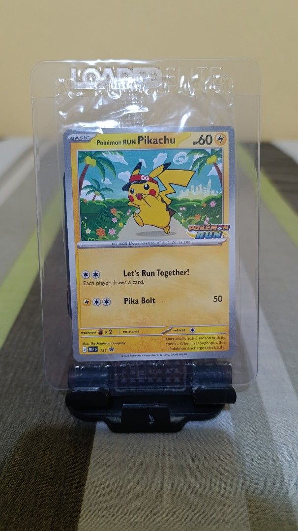 Pikachu MEP131 (Category: Raw Singles) located in Manila. Submitted by ytjamesgam91955 (Listing ID 1469882736, Image 1). Description: Pokémon Run Pikachu English Promo Card 8k negotiable for sure buyer protected with teambag and bubble wrap loc valenzuela.