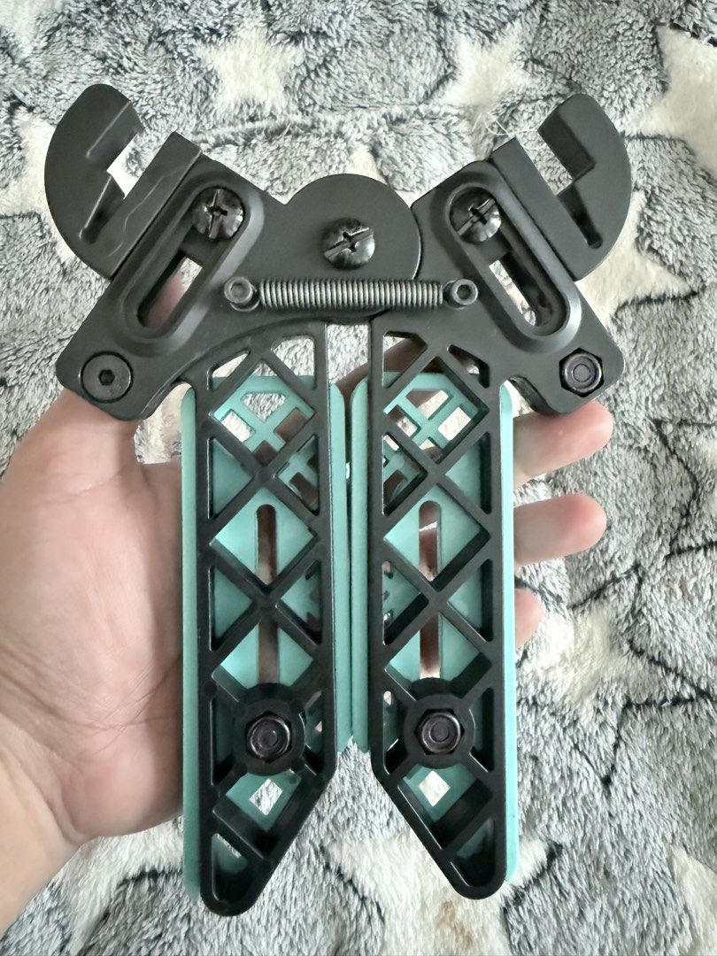 Pine Ridge Archery Kwik Stand Compound Bow Stand (Category: Other Sports Equipment and Supplies) located in Mandaluyong City. Submitted by maricris.sn (Listing ID 1469770517, Image 2). Description: Pine Ridge Archery Kwik Stand. Made in USA. Black and teal colorway. Spring-loaded design with adjustable limbs. Clamps onto compound bow limbs securely. Keeps bow off the dirt during target practice or hunting trips. Folds up compact for easy transpor