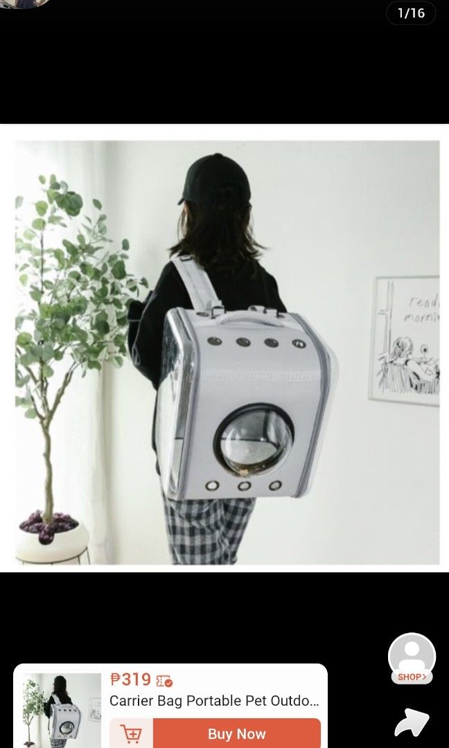 Pink Bubble Window Cat Backpack Carrier (Category: Homes & Other Pet Accessories) located in Cainta. Submitted by ej_emuslan (Listing ID 1469790002, Image 3). Description: - Color/Design: Pink with grey trim and a trendy clear front bubble window - Perfect For: Small cats and dogs - Ventilation: Multiple holes to keep your pet cool and comfortable - Closure: Secure edge-to-edge zippers - Portability: Sturdy top handle for easy carrying.