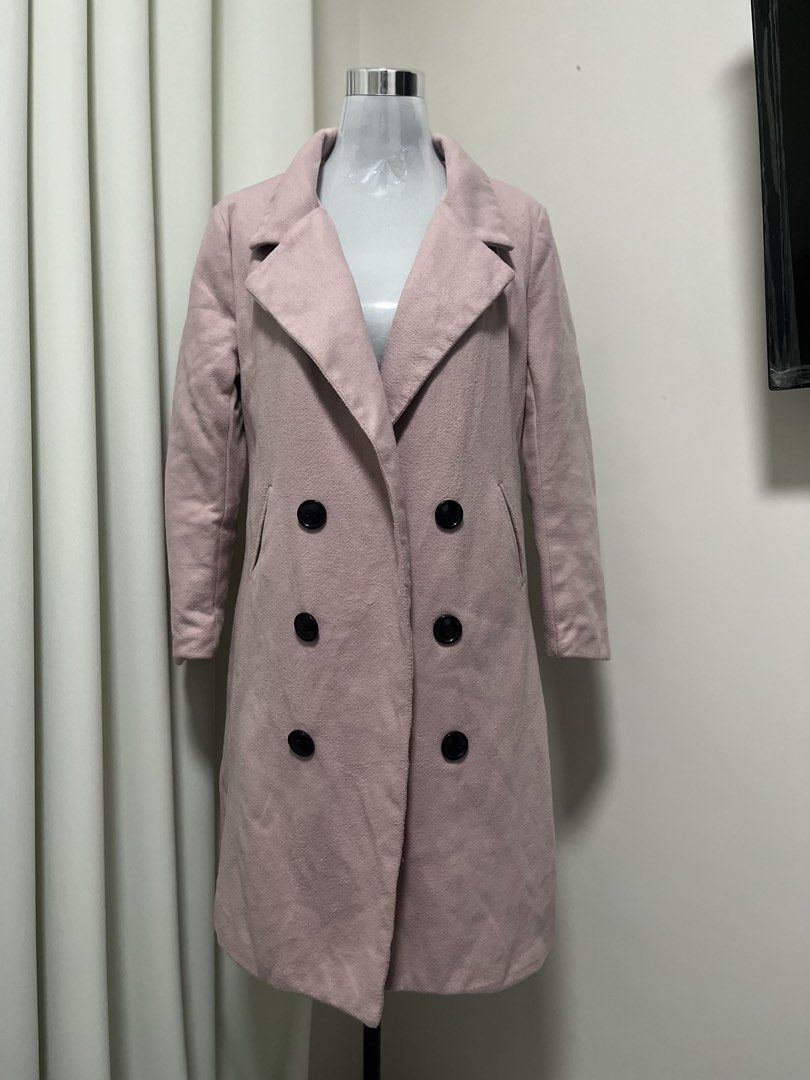 Pink Double-Breasted Woolen Coat (Category: Coats, Jackets and Outerwear) located in Angeles City. Submitted by pinkpool (Listing ID 1469765241, Image 1). Description: - Color: Stylish pink with striking black buttons - Style: Double-breasted long coat with a classic lapel collar - Features: Two functional side pockets - Material: Thick, high-quality fabric, perfect for cold weather - Size: Standard sizing.
