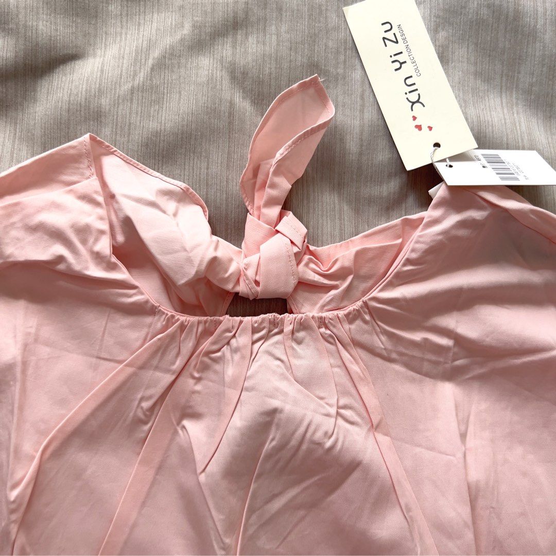 Pink Ruffle Sleeve Blouse (Category: Blouses) located in Pasig City. Submitted by jenscloset86 (Listing ID 1469862273, Image 3). Description: Brand: Xin Yi Zu BRAND NEW! BRAND NEW! BRAND NEW! •Tie at the neck •Shirred sleeve •Nice quality product Available in Small & Medium only Measurement: SMALL Length: 22” Bust: 36” Sleeve: 16” MEDIUM Length: 22” Bust: 40 Sleeve: 16”.