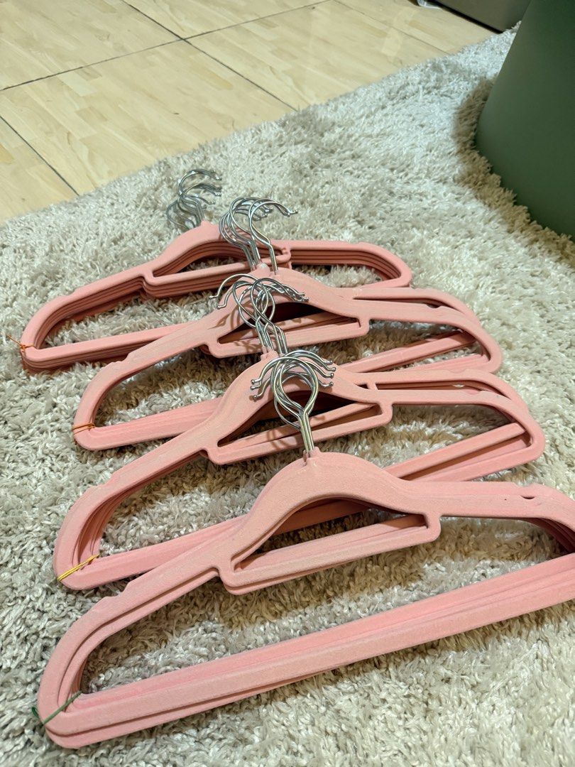 Pink Velvet Clothes Hangers (Category: Hooks & Hangers) located in Mandaluyong City. Submitted by riz_040521 (Listing ID 1469795727, Image 1). Description: - Color: Chic pink - Material: Soft velvet-textured coating - Hook: 360-degree swiveling metal hook - Non-slip design prevents clothes from falling - Space-saving profile to tidy up your wardrobe - Comes conveniently stacked and bundled with rubber bands -25 pieces for 250 pesos.
