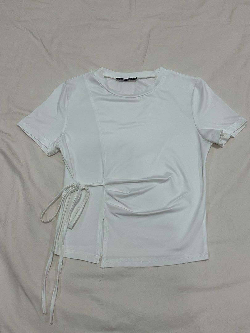 Plain White Top Shirt w Ribbon (Category: Shirts) located in Caloocan City. Submitted by style.haven (Listing ID 1469898281, Image 1). Description: No damage. Very silky-soft material ✨ Best fit small sizes .
