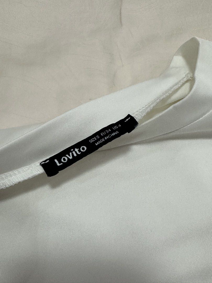 Plain White Top Shirt w Ribbon (Category: Shirts) located in Caloocan City. Submitted by style.haven (Listing ID 1469898281, Image 2). Description: No damage. Very silky-soft material ✨ Best fit small sizes .