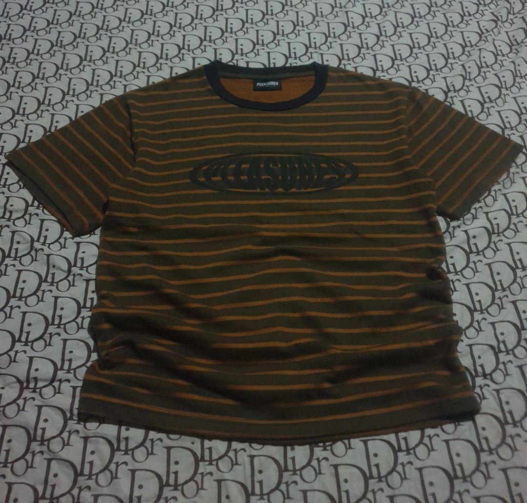 Pleasures stripe tshirt (Category: Tshirts & Polo Shirts ) located in San Fernando. Submitted by retro.district. (Listing ID 1469898157, Image 1). Description: - Pleasures stripe tshirt - Size: Large(21x27) - Condition: Excellent - No issue - Color Rate: 9.5/10.