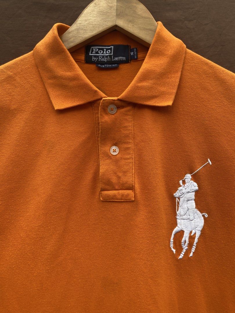 Polo by Ralph Lauren Big Pony (Category: Tshirts & Polo Shirts ) located in Antipolo. Submitted by treasurethings02 (Listing ID 1469765625, Image 2). Description: Polo by Ralph Lauren Polo shirt Excellent Condition 9/10 CR Orange Color Cotton material Dimensions 20W/27L Medium on tags Issue Minimal lints Check Photo Details ganda neto🫶🏻.