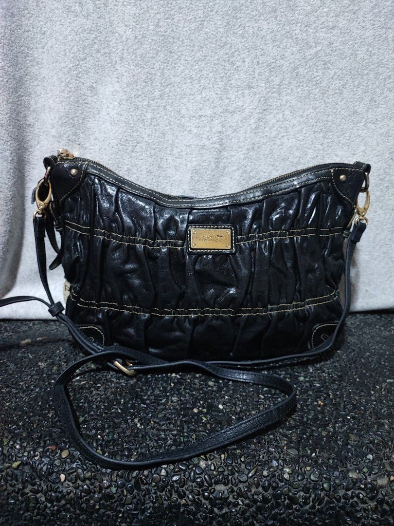 Polo Franco Black Leather Shoulder Bag (Category: Luxury Bags & Wallets) located in Baguio. Submitted by ozara.06 (Listing ID 1469829520, Image 1). Description: Polo Franco sling bag Medium size Issue: dumi lang sa loob 800.