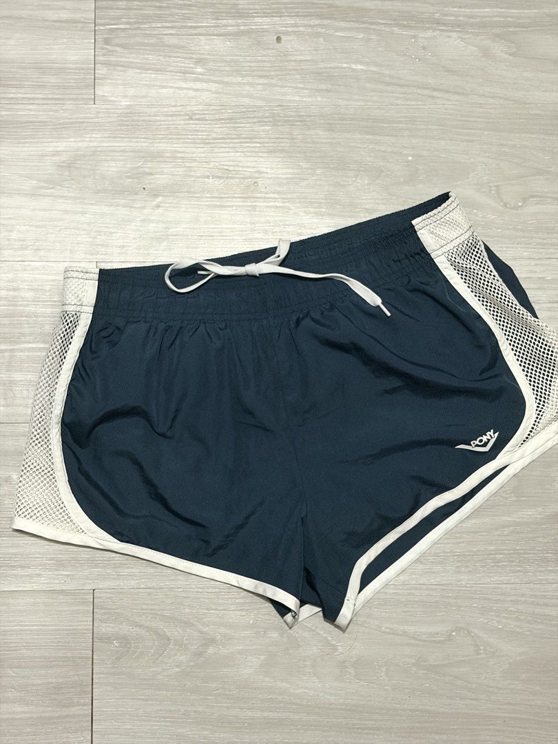 PONY Athletic Running Shorts Dark Grey Mesh Size Large (Category: Activewear) located in Manila. Submitted by happytiger-d966 (Listing ID 1469843169, Image 1). Description: - Brand: PONY - Color: Dark grey with white mesh side panels - Size: Large - Material: 100% polyester shell with 95% poly / 5% spandex inner lining - Features: Drawstring waistband for an adjustable fit - Care: Machine washable - Condition: Excellent / Great for workouts and c