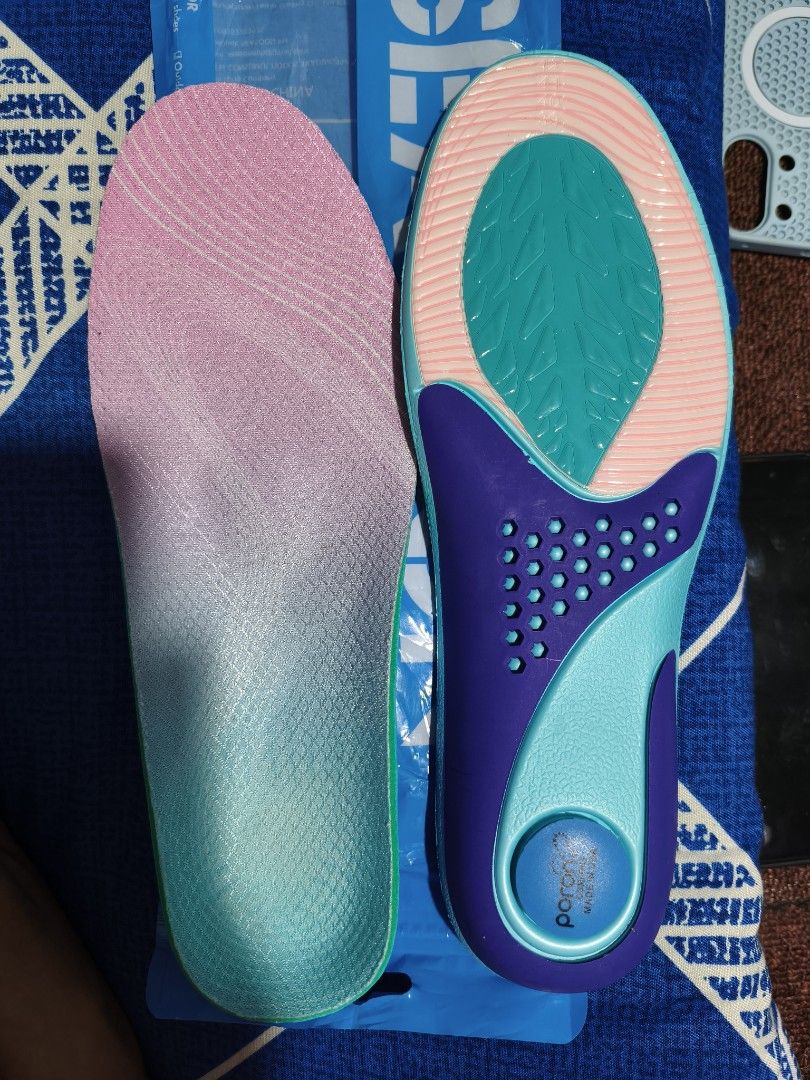 Poron Performance Orthotic Insoles Arch Support (Category: Shoe inserts & accessories) located in Caloocan City. Submitted by zachyjyrocy (Listing ID 1469946024, Image 1). Description: - Condition: Brand new, unused in original plastic packaging - Size: Fits shoe sizes 40-49 (adjustable with trim markings on the sole) - Support: Built-in arch support and Poron performance heel cushioning for maximum comfort - Design: Eye-catching pink, turquoise,