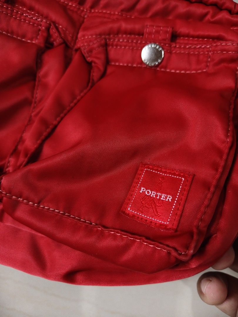 Porter Yoshida Red Nylon Sling Bag (Category: Sling Bags) located in Iloilo. Submitted by branded-boy0422_16 (Listing ID 1469764326, Image 2). Description: W: 11 L: 8 Good as new Need Washed only.