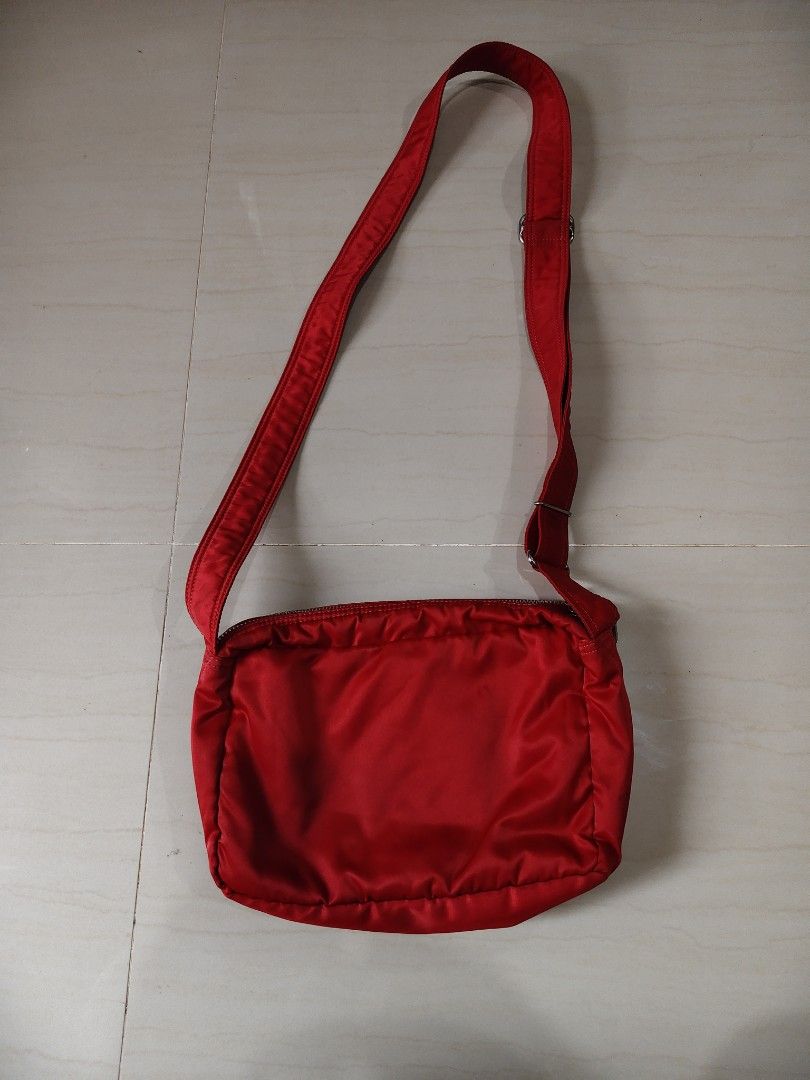 Porter Yoshida Red Nylon Sling Bag (Category: Sling Bags) located in Iloilo. Submitted by branded-boy0422_16 (Listing ID 1469764326, Image 3). Description: W: 11 L: 8 Good as new Need Washed only.