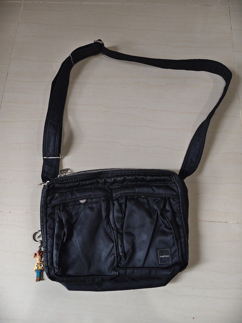 Porter Yoshida Sling Bag (Category: Sling Bags) located in Iloilo. Submitted by branded-boy0422_16 (Listing ID 1469764061, Image 1). Description: W: 12 L: 10 Good as new ISSUE: LAST Pic Small Scratch Only.