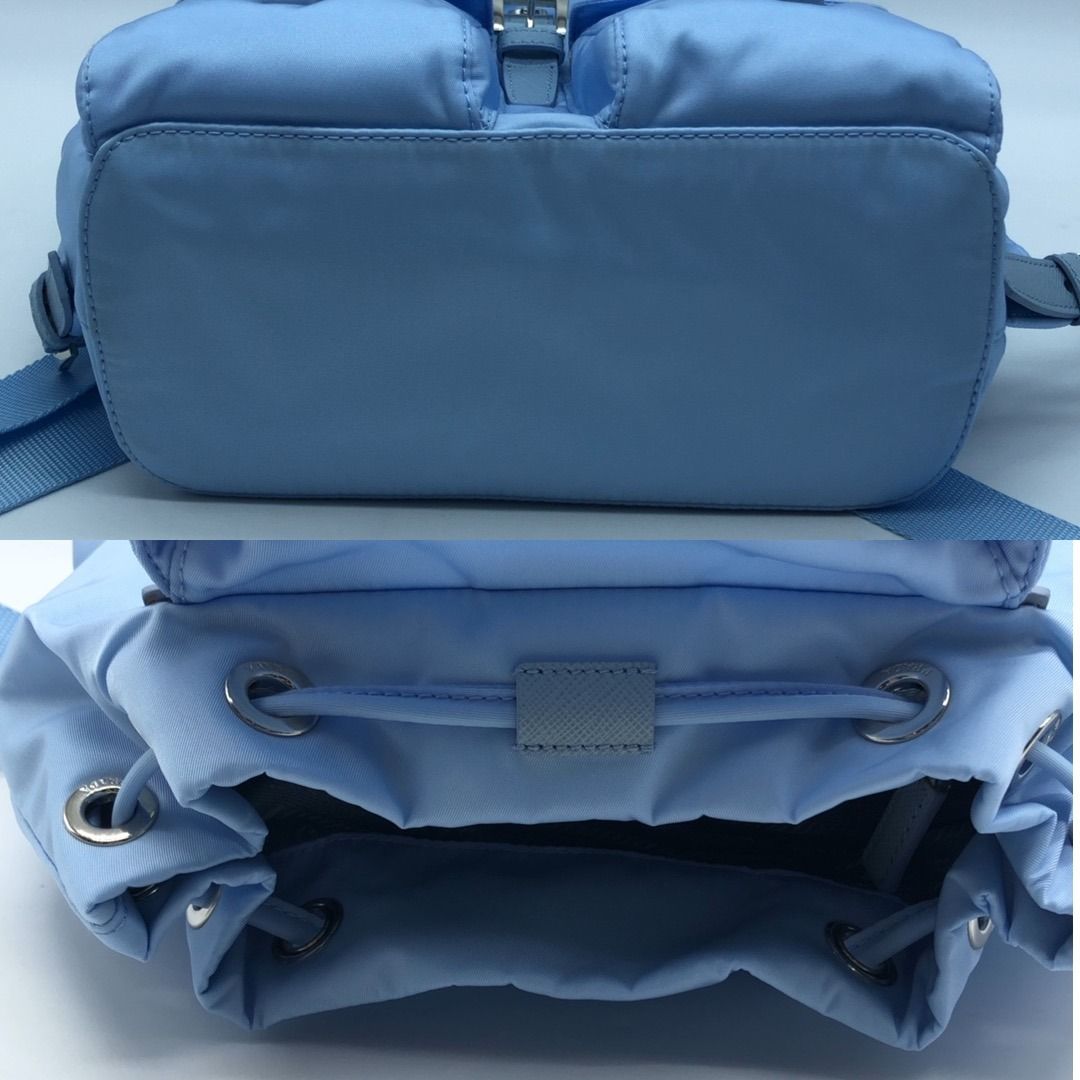 PRADA BAG NYLON BACKPACK LIGHT BLUE (Category: Luxury Bags & Wallets) located in Taguig. Submitted by ecoring.ph (Listing ID 1469805195, Image 3). Description: ◆CONDITION: AB ◆DESCRIPTIONS: (Other defects/info:) OUTER: The body of the bag has very minimal stains. HARDWARE: The hardware of the bag has minor scratches. The overall condition of the bag remains good and almost new. ◆SIZE: ⁎WIDTH: 24cm. (approximately only) *HEIGHT: 20cm. (approximate