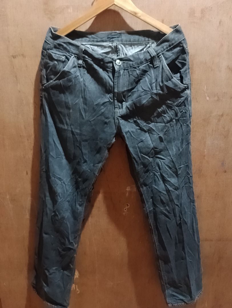 Prada Dark Grey Indigo Denim Jeans Size 32-34 (Category: Jeans) located in Cavite. Submitted by marvzclothing (Listing ID 1469893099, Image 1). Description: - Brand: Prada - Color: Dark Grey (Pure Indigo Denim) - Size: Tagged Size 32-34 - Fit: Regular Fit - Material: 98% Cotton, 2% Other Fibers - Hardware: Branded button and YKK zipper fly - Origin: Made in Romania - Condition: Great quality casual jeans designed to age beautifully with natural f