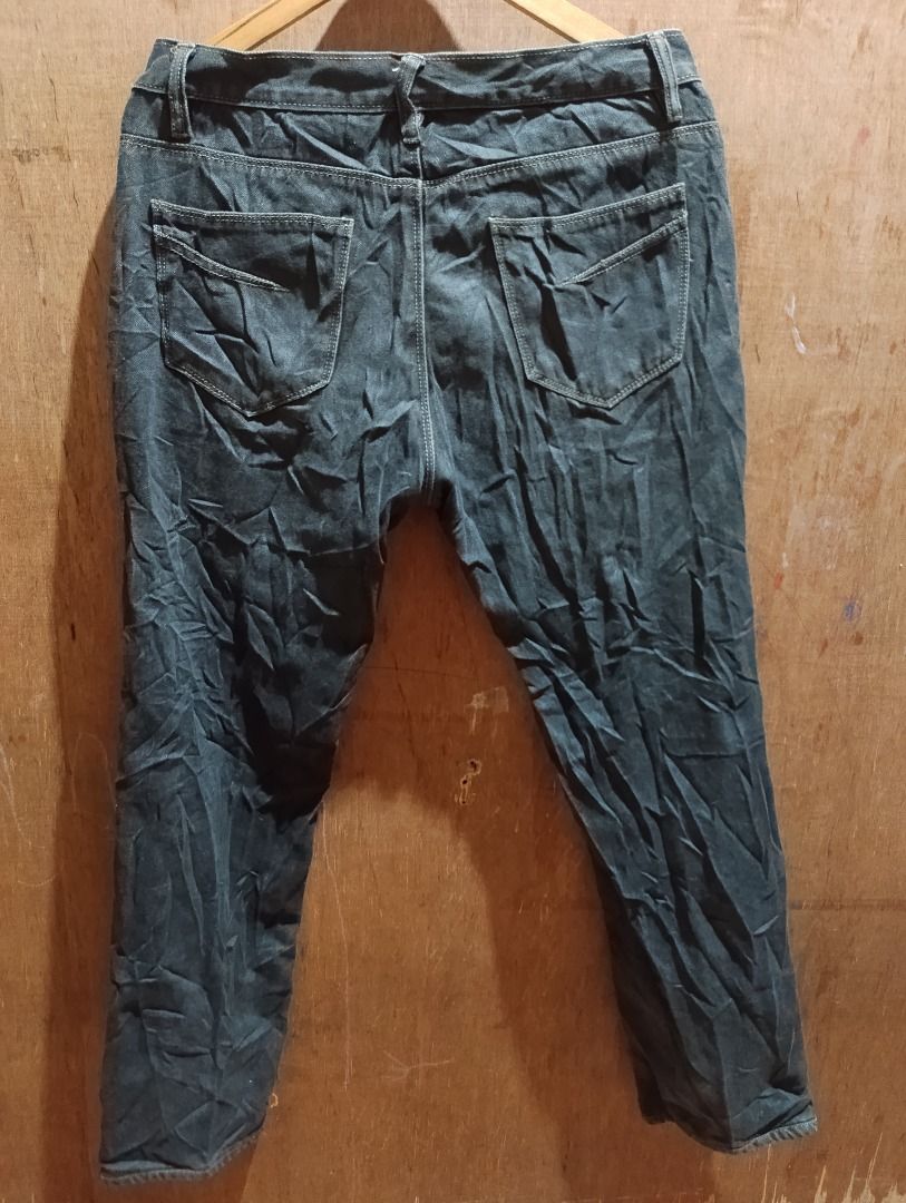 Prada Dark Grey Indigo Denim Jeans Size 32-34 (Category: Jeans) located in Cavite. Submitted by marvzclothing (Listing ID 1469893099, Image 2). Description: - Brand: Prada - Color: Dark Grey (Pure Indigo Denim) - Size: Tagged Size 32-34 - Fit: Regular Fit - Material: 98% Cotton, 2% Other Fibers - Hardware: Branded button and YKK zipper fly - Origin: Made in Romania - Condition: Great quality casual jeans designed to age beautifully with natural f
