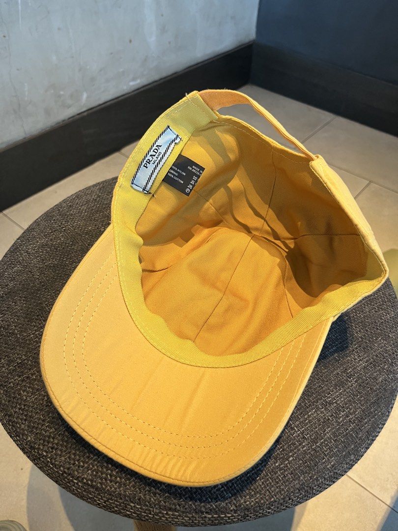 PRADA MUSTARD YELLOW NYLON (Category: Hats & Beanies) located in Quezon City. Submitted by headline. (Listing ID 1469827632, Image 3). Description: PRADA SIDE LOGO MUSTARD YELLOW VELCRO EXCELLENT CONDITION FOR ONLY:1,250php +SHIPPING FEE.