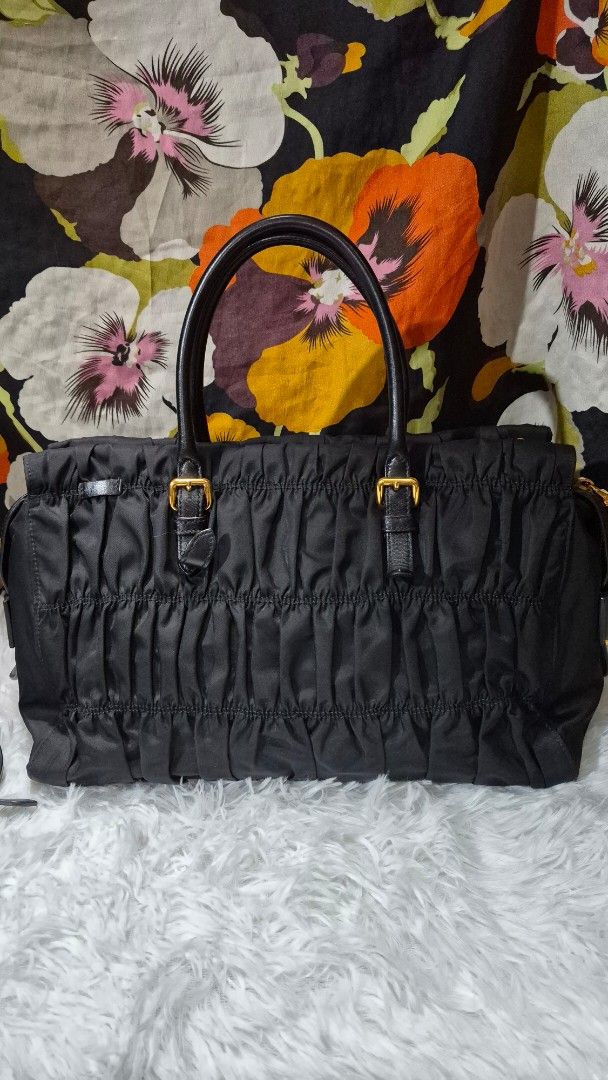 Prada nylon quilted (Category: Luxury Bags & Wallets) located in Baguio. Submitted by jhaz_bags (Listing ID 1469900415, Image 3). Description: very good condition supet nice see photos for details.