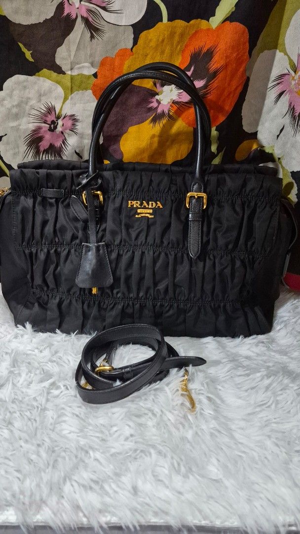 Prada nylon quilted (Category: Luxury Bags & Wallets) located in Baguio. Submitted by jhaz_bags (Listing ID 1469900415, Image 2). Description: very good condition supet nice see photos for details.