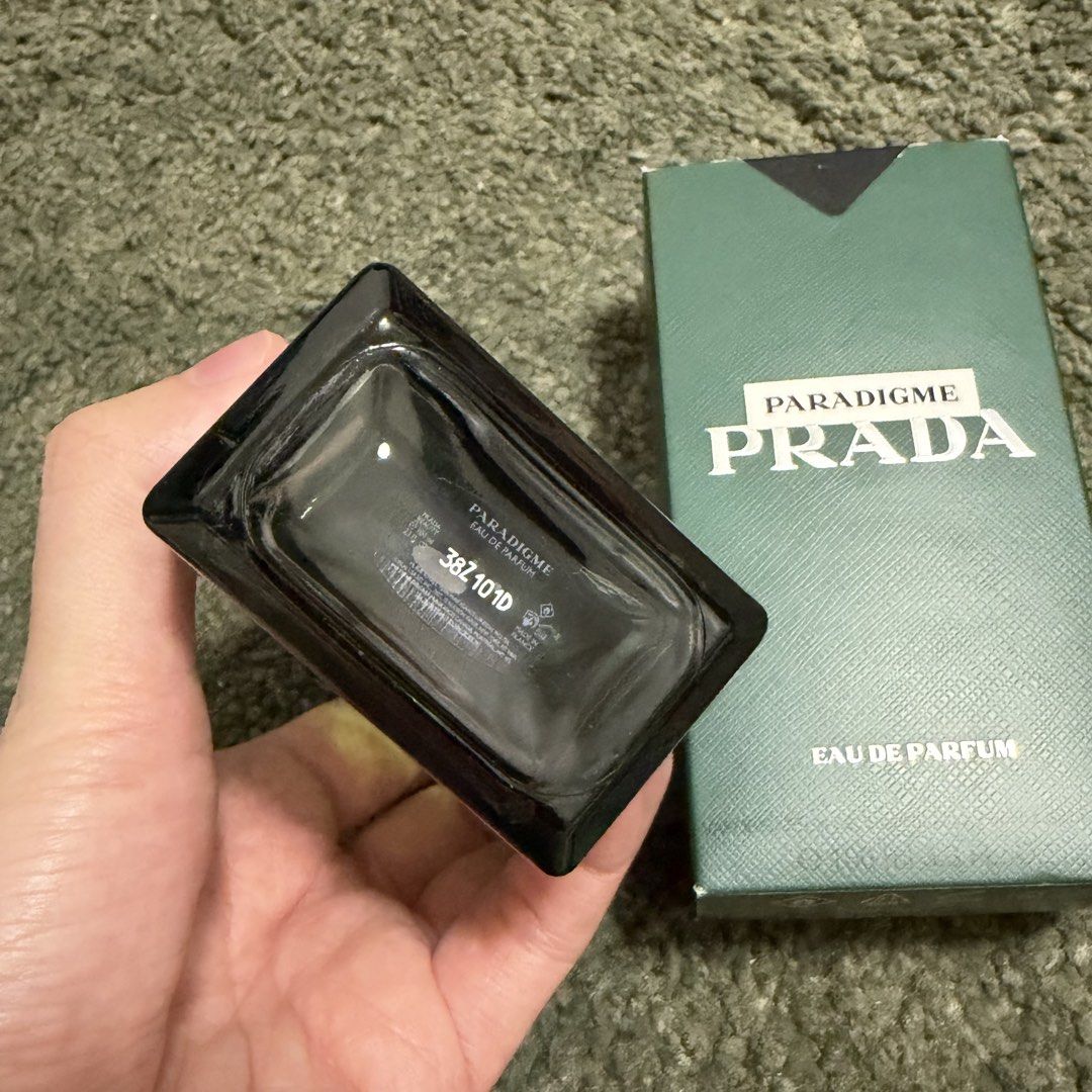 Prada Paradigme EDP 100ml (Category: Fragrance & Deodorants) located in Manila. Submitted by usetheoxfordcomma (Listing ID 1469910923, Image 3). Description: Comes with box and paper bag Around 75 mL left .