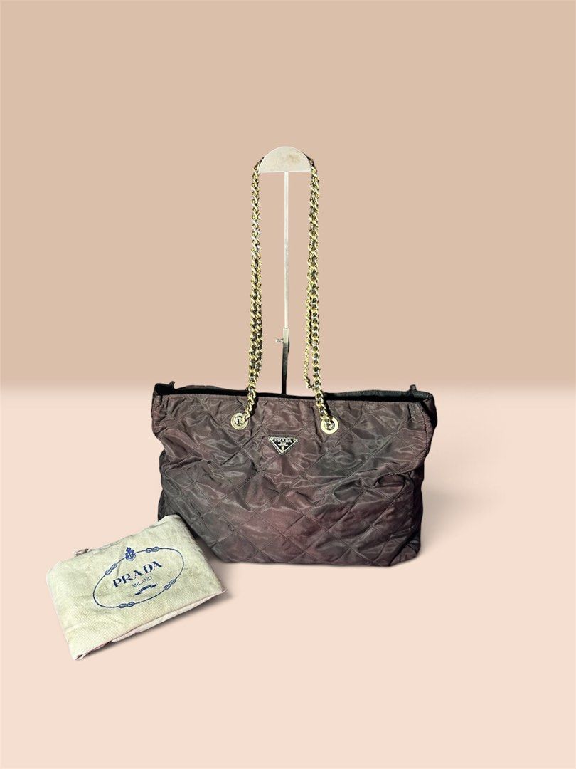 PRADA Rare Large Catena Chain Tote (Category: Luxury Bags & Wallets) located in Cagayan de Oro. Submitted by kjcartier26 (Listing ID 1469921720, Image 2). Description: Rare Prada. Vintage 3 C’s Puller - Large tote Bag. - In good condition. - With Dustbag Inclusion. - Good nylon, Clean stiches, No holes. - Good corners, zipper, And Magnetic closure. - Minimal faded chain, but no major flaws. - The color of the bag As is, I can’t find it somewhere 