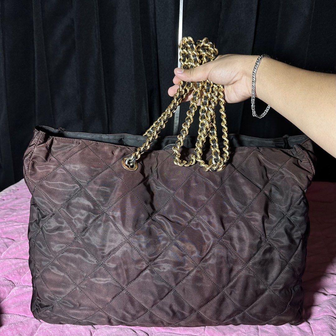 PRADA Rare Large Catena Chain Tote (Category: Luxury Bags & Wallets) located in Cagayan de Oro. Submitted by kjcartier26 (Listing ID 1469921720, Image 3). Description: Rare Prada. Vintage 3 C’s Puller - Large tote Bag. - In good condition. - With Dustbag Inclusion. - Good nylon, Clean stiches, No holes. - Good corners, zipper, And Magnetic closure. - Minimal faded chain, but no major flaws. - The color of the bag As is, I can’t find it somewhere 