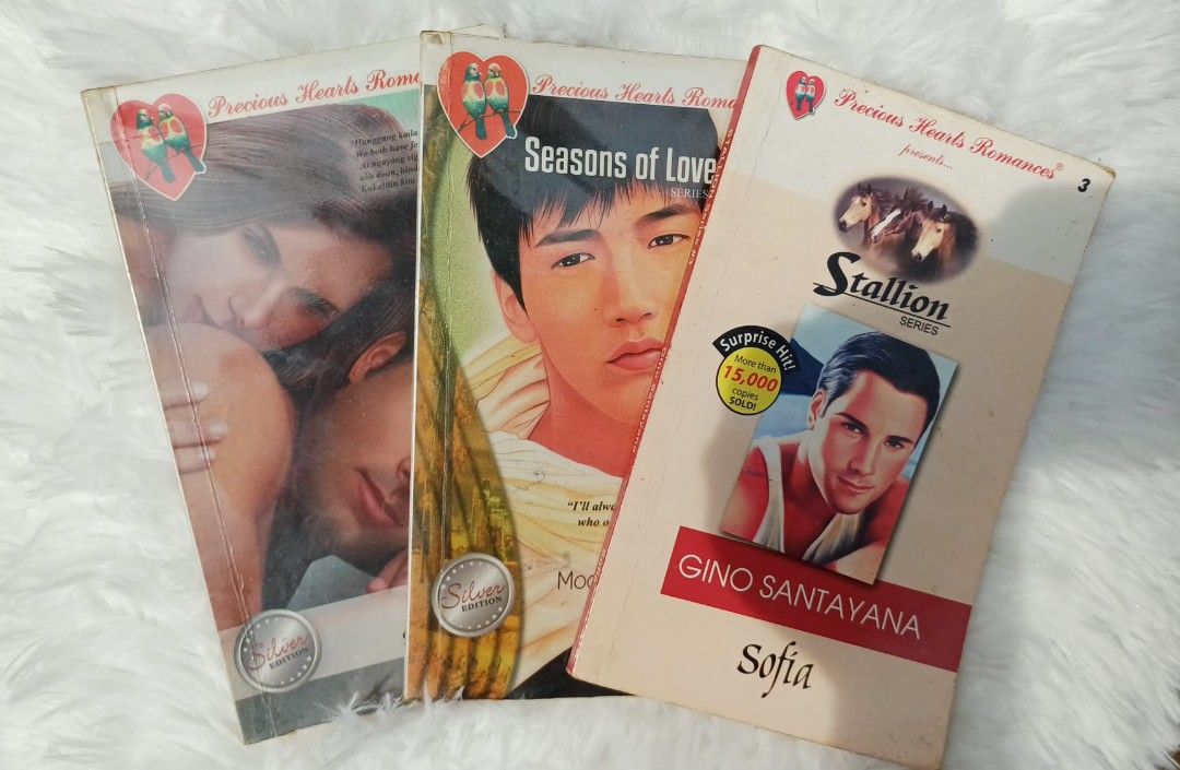 Precious Hearts Romances paperback novels bundle (Category: Storybooks) located in Manila. Submitted by freeforest.58121f (Listing ID 1469803908, Image 1). Description: - Set of 3 Precious Hearts Romances paperbacks - Includes Seasons of Love Series and Stallion Series by Sofia - Format: Paperback with illustrated covers - Condition: Good for collection or casual reading - Genre: Classic Filipino romance fiction.