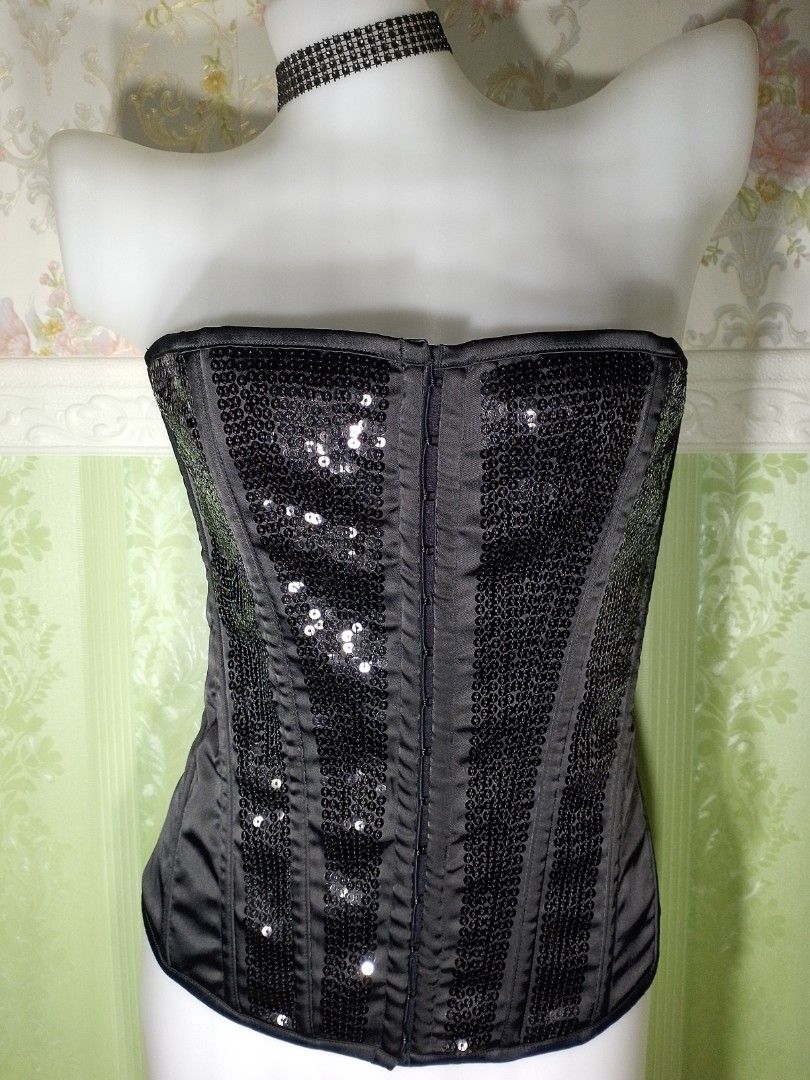 Preloved Ann Summers Black Corset Top (Category: Others Tops) located in Dasmarinas. Submitted by ms.happycorsets (Listing ID 1469901147, Image 1). Description: Preloved Black Corset Top Black Color Can Fit Large size Starting waistline 31-33 inches Starting Bust size 36 inches length 14 1/2 inches Stretchable Fabric Not Padded Has Lace tie Adjustable at the back Has Front Hooks Has 14 Soft bones with Slight flaws Actual Photo Color may Change du