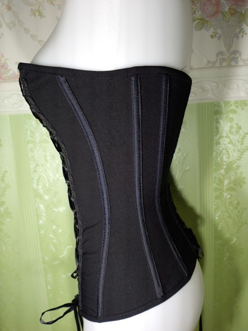 Preloved Black Gothic Corset Top XS (Category: Others Tops) located in Dasmarinas. Submitted by ms.happycorsets (Listing ID 1469889090, Image 3). Description: Preloved Black Corset Top Black Color Can Fit small size Starting waistline 25-27 inches length 16 inches Stretchable Fabric Not Padded Has Lace tie Adjustable at the back Has 12 Soft bones with Slight flaws Actual Photos Color may Change due to Camera Flash 💕 Disregard the lines due to fl