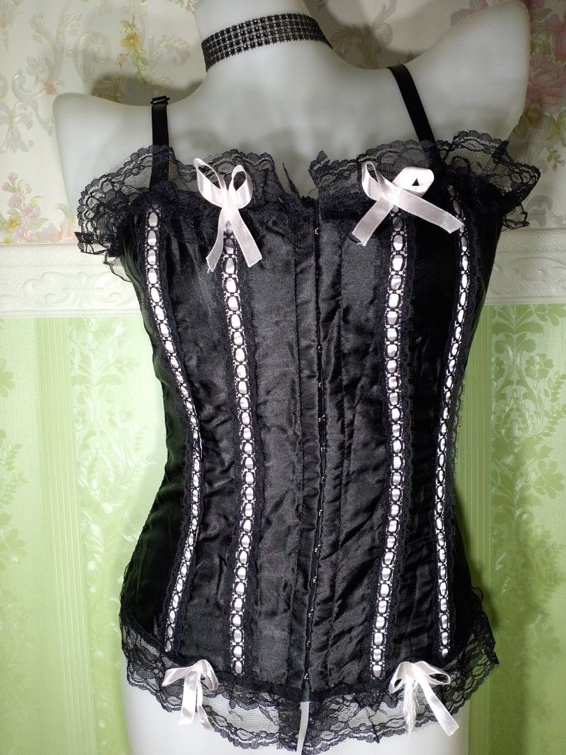 Preloved Black Gothic Corset Top Large (Category: Others Tops) located in Dasmarinas. Submitted by ms.happycorsets (Listing ID 1469893770, Image 1). Description: Preloved Black Corset Top Black Color Can Fit Large size Starting waistline 30-32 inches length 22 inches Not Stretchable Fabric Not Padded Has Lace tie Adjustable at the back Has Front Hooks Has 10 Soft bones with Slight flaws left light pink ribbon has satin run Actual Photo Color may 