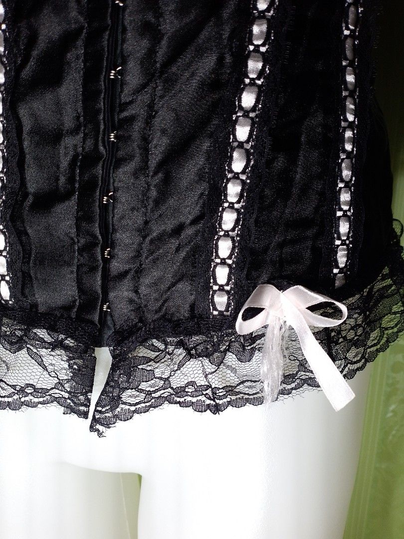 Preloved Black Gothic Corset Top Large (Category: Others Tops) located in Dasmarinas. Submitted by ms.happycorsets (Listing ID 1469893770, Image 3). Description: Preloved Black Corset Top Black Color Can Fit Large size Starting waistline 30-32 inches length 22 inches Not Stretchable Fabric Not Padded Has Lace tie Adjustable at the back Has Front Hooks Has 10 Soft bones with Slight flaws left light pink ribbon has satin run Actual Photo Color may 